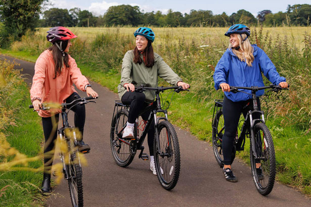 Like Bikes, Three friends take a break on Greenway